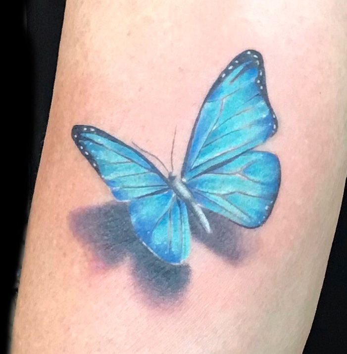 Blauer Schmetterling mit 3D-Schatten